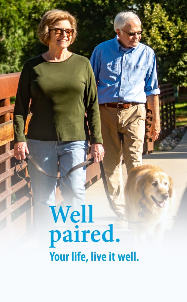 CLC well paired campaign couple walking their dog portrait 186x300 1